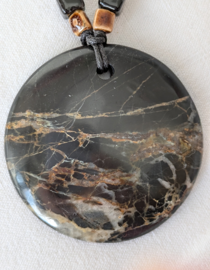 Onyx noir veiné brun "planete".